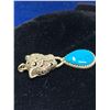 Image 3 : Natural Turquoise 10.18 Carat Cabochon Cut Stone Set in .925 Silver Panther Pendant with Appraisal C
