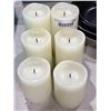 Image 2 : A 6 piece assorted sizes battery operated white candle set.