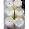 Image 3 : A 6 piece assorted sizes battery operated white candle set.