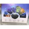 Image 3 : Starry Night light projector, perfect for single room decoration.