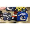 Image 2 : LOT OF CANUCKS ITEMS, INCLUDING GLOVES, SWEATSHIRT, JERSEY, NFL TOQUES AND MORE