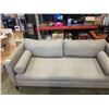 Image 2 : MODERN SOFA WITH HEAVY FILLED CUSHIONS, GREY FABRIC AND WALNUT WOOD TRIM