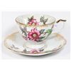 Image 1 : IRIDESCENT FLOWER DESIGN TEA CUP AND SAUCER