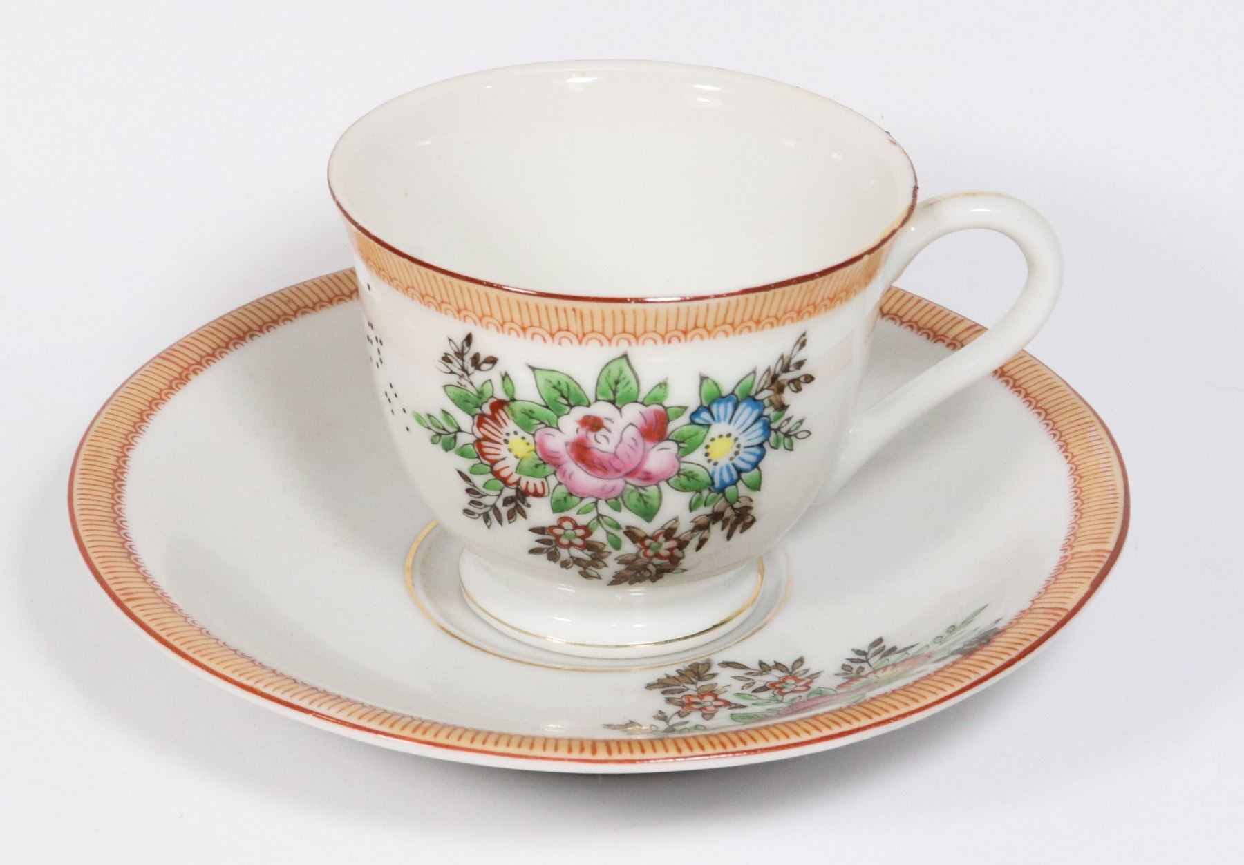 FLOWER PATTERN TEA CUP AND SAUCER