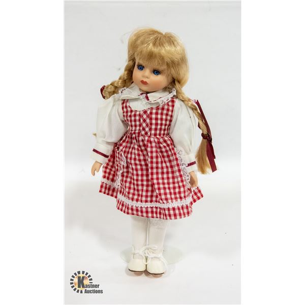 VINTAGE PORCELAIN DOLL IN CHECKERED