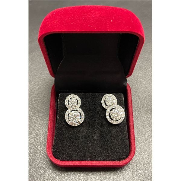 4 Full cut round brilliant moissanite VVS stones weighing an approx. total 4.15 carat set in silver