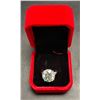 Image 1 : One full cut round brilliant moissanite VVS greenish blue stone weighing approx. 11.60 carat set in