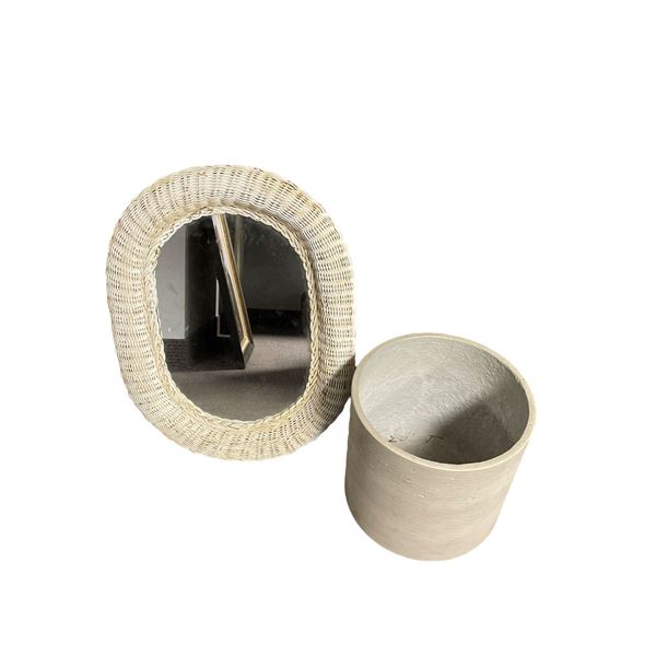 Wicker framed small wall mirror w/ plastic planter