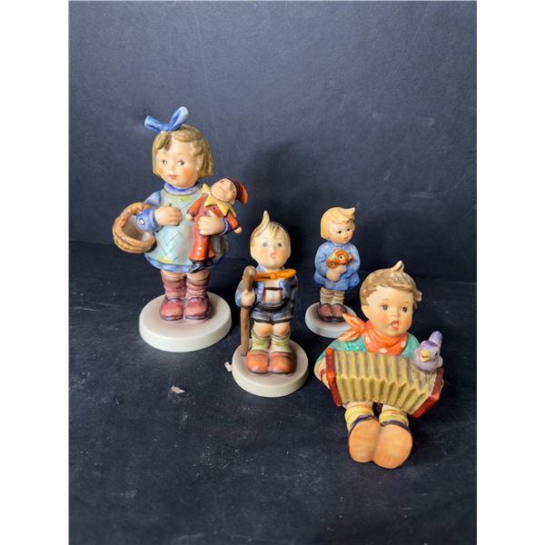 Group of 4 various German inspired Hummel