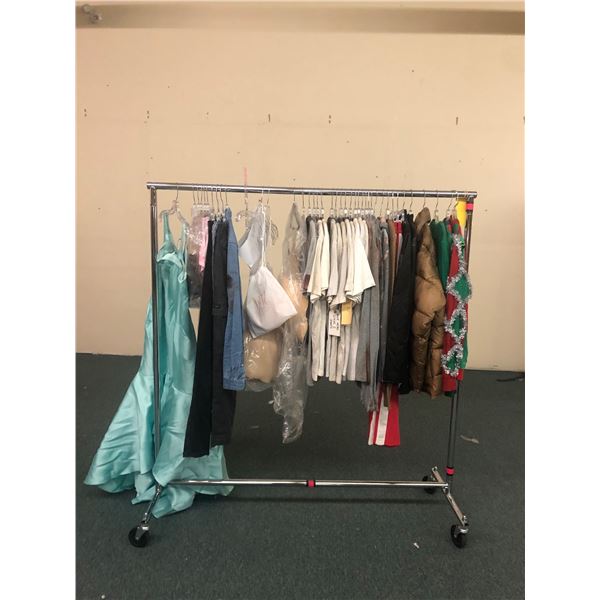 Rack full of misc. set dec clothes - included Christmas sweaters/t-shirts/jeans/dresses (approx. 40