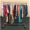 Image 1 : Rack full of misc. women clothes - included shirts/pants/dresses (approx. 100 pcs) RACK IS INCLUDED