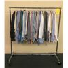 Image 1 : Rack full of misc. man clothes - included assorted shirts (approx. 80 pcs) RACK IS INCLUDED