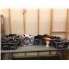Image 1 : 7 boxes full of misc. accessories - included socks/hats/belts (approx. 150 pcs)
