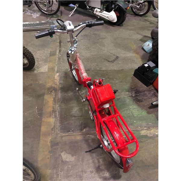 Small red electric bike (with key - not tested)