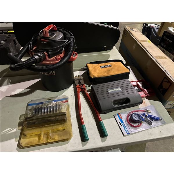 Group of misc tools including - Milwaukee drill bit set, Mastercraft tire inflation gun, Mastercraft