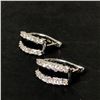 Image 1 : 10Kt White Gold Earrings (4.6 grams) w/0.70-carat diamonds (70 points/Natural Earth Mined Diamond) -