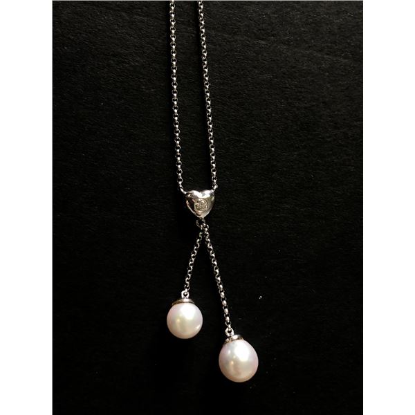 18Kt White Gold (3.1 grams) w/pearl & 0.10-carat diamond pendent