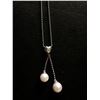 Image 1 : 18Kt White Gold (3.1 grams) w/pearl & 0.10-carat diamond pendent