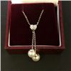 Image 2 : 18Kt White Gold (3.1 grams) w/pearl & 0.10-carat diamond pendent