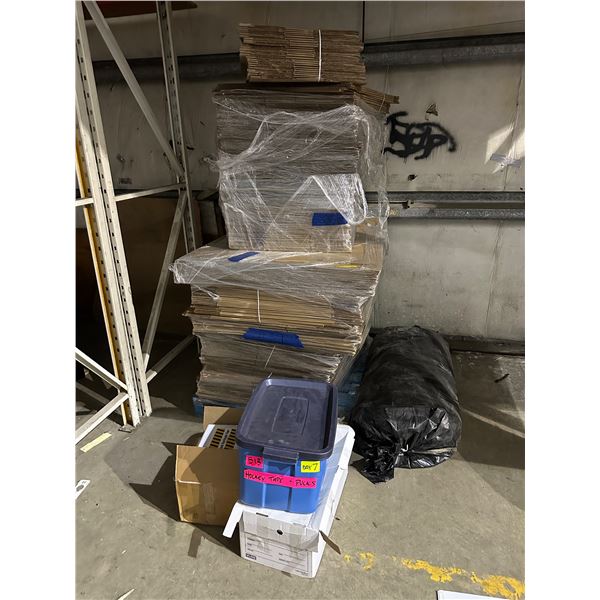 Large group of misc including - pallet of cardboard boxes, movie set stock barricade tape, hockey ta