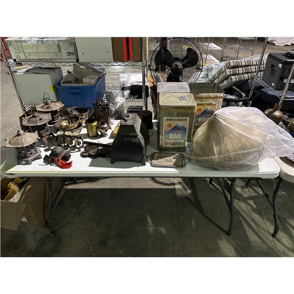 Table of misc items including - Asian style decor, candle holders, lanterns, Japanese cracker tins, 