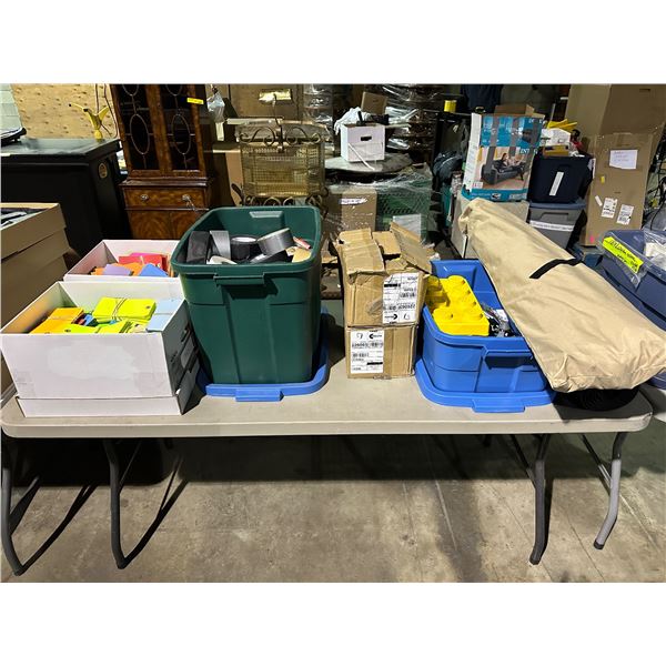 Table of misc items including - lego, 2 boxes of note tags, box of various tape, etc...