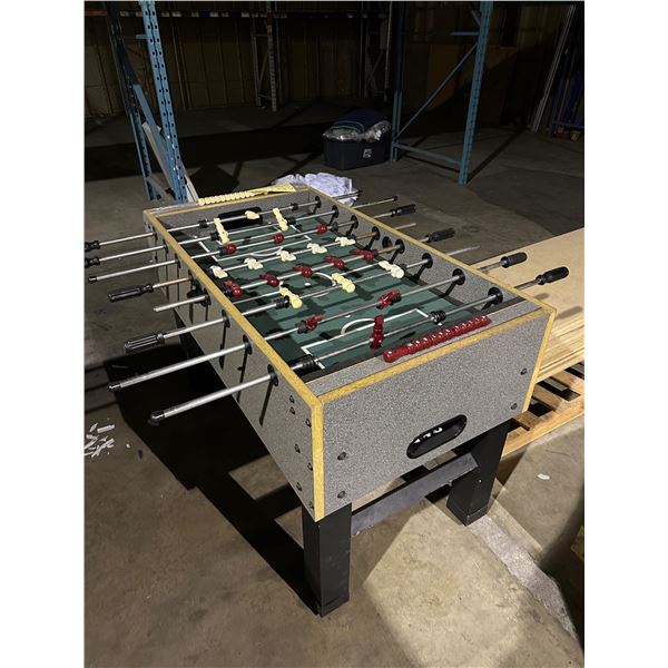 Foosball table approx. 55in long 25in wide