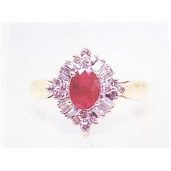 Ruby and Diamond Lady's Ring 14k Gold,  Ruby is approximately .80 carats, Full and Baguette Cut Diam
