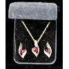 Image 1 : GOLD TONED PENDANT AND EARRINGS W/ RED STONES