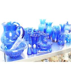 Large collection of cobalt blue glass; 2 water jugs; mixing bowl, salt and pepper shaker; 10 water g