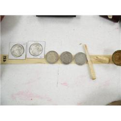 Lot of: 1883 silver dollar; 1885 silver dollar; 1921 silver dollar; 1922 silver dollar; 1923 silver 
