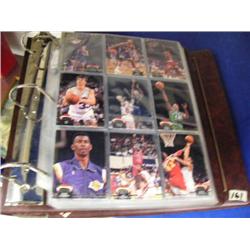 Binder filled with basketball cards (27)