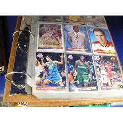 Binder filled with basketball cards (27)