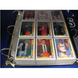 Binder filled with basketball cards (27)
