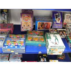 18 boxes of basketball, football, and hockey cards (27)