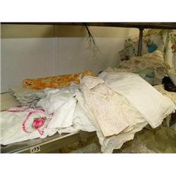 Collection of lace and linen and fancy old gloves and doll clothes (16)