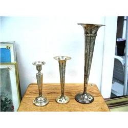 Lot of: 2 sterling silver bud vases; candle stick (25)