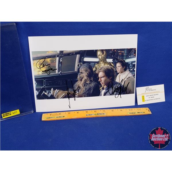 STAR WARS Cast Signed Photo: Harrison Ford; Carrie Fisher; Peter Mayhew (Chewbacca) (8x10) (with COA