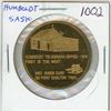 Image 1 : Humboldt, Saskatchewan brass medal. Depicts the first Telegraph Office in the West & a Red River Car