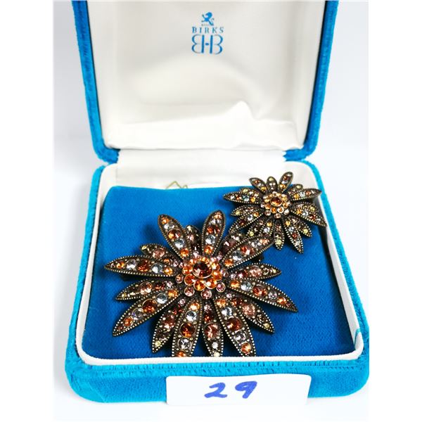 two matching Joan River brooches, Swarovski stones