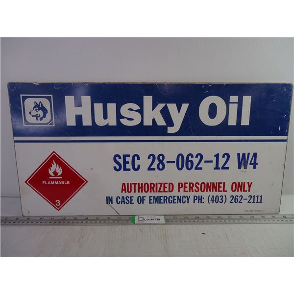 Metal Husky Oil Sign- 23.5  long by 12  Wide