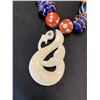 Image 2 : BONE CARVED HEI TIKI BEADED NECKLACE