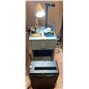 Image 1 : Small Side Table With Variety Of Office Equipment, Lamps, Pen Holders And WMC303x Paper Shredder