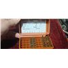 Image 1 : 14 ROUNDS OF 222 REM AMMO PLUS 10 BRASS IN PLASTIC AMMO BOX