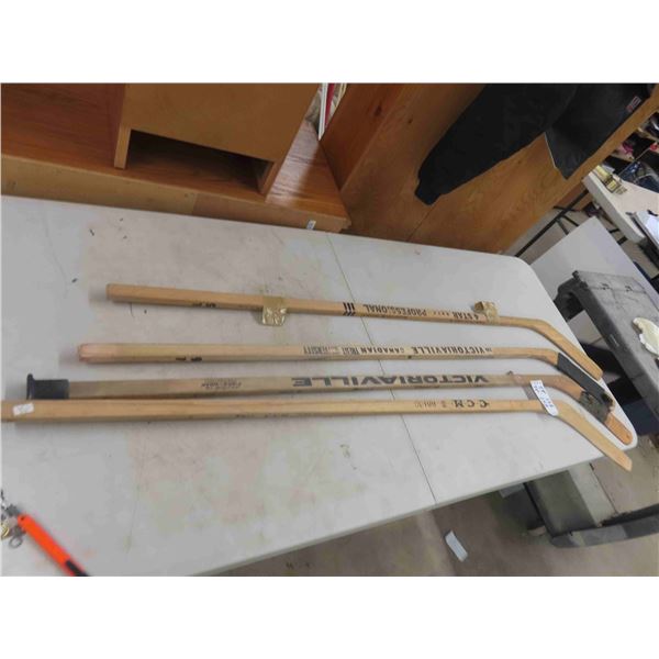 4 Vintage Hockey Sticks