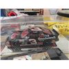 Image 2 : Nascar Package: Diecast Car, License Plate, Shirt, Lighter, Magazines, Plus