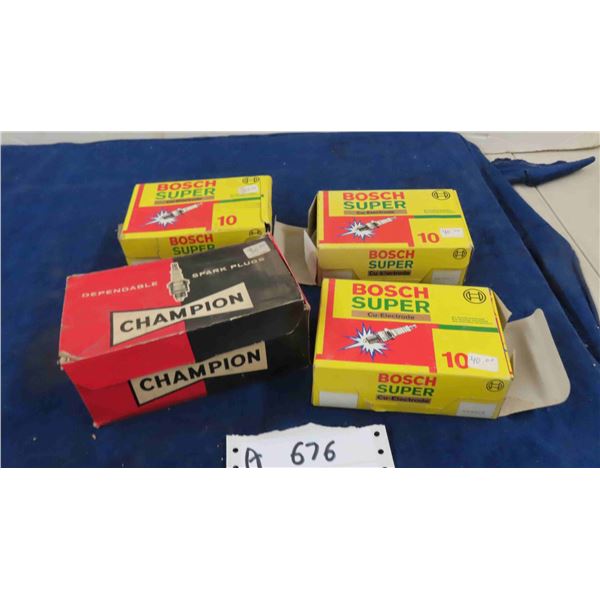 4 Boxes of Champion / Bosch Spark Plugs 36 Total