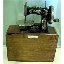 Stitchwell Child's Sewing Machine With Original Wooden Case