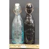 Image 1 : LOT OF 2 - EMBOSSED BREWERY BOTTLES - INCL MILLER & LOESCHER