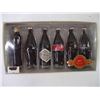 Image 2 : (2) Collectible Coca Cola-1958 Fountain Machine Musical and The Evolution of the Coca Cola Bottle